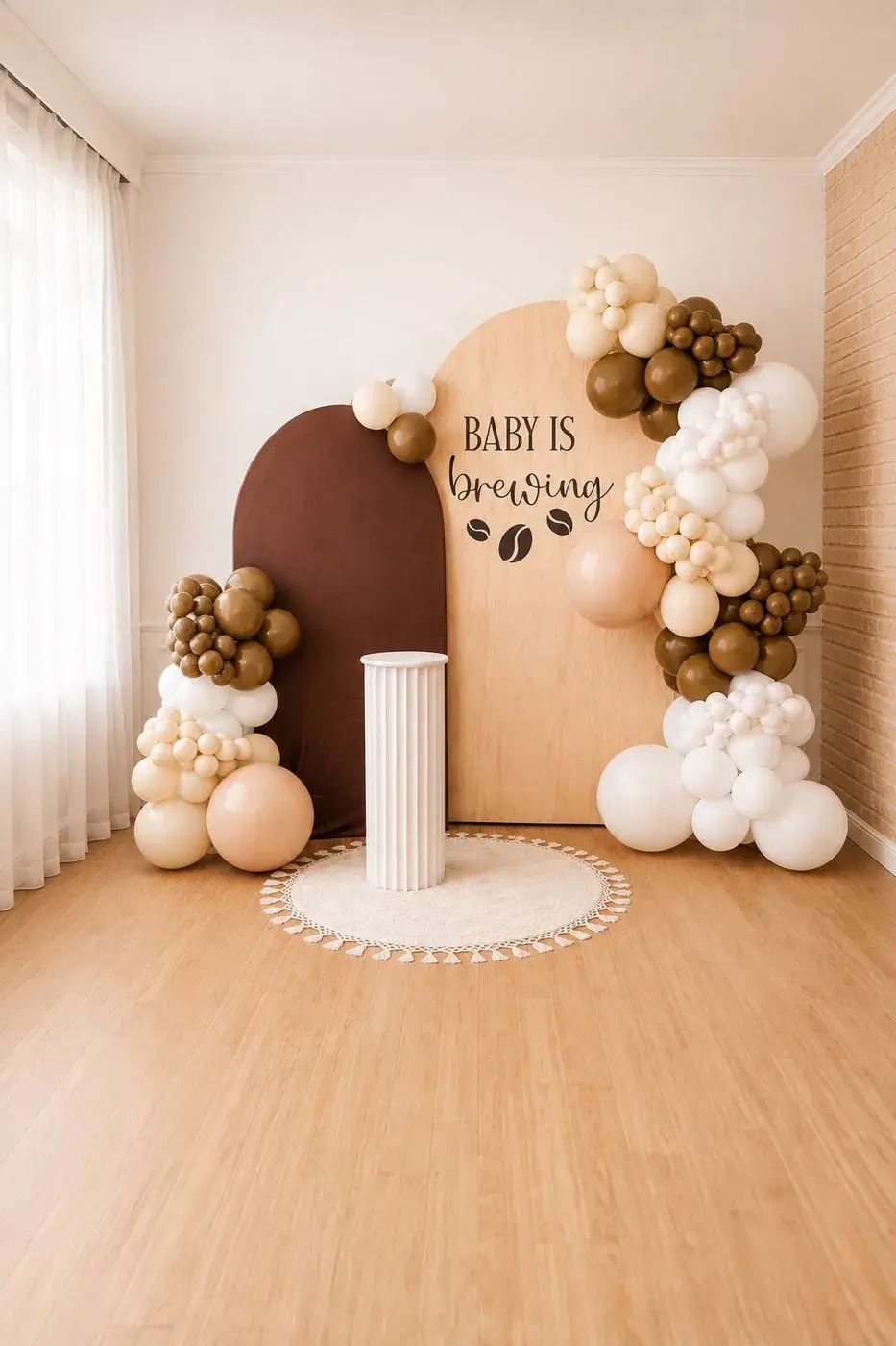 Coffee themed baby shower with espresso and cream arched panels
